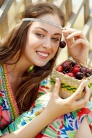 7355665-portrait-of-pretty-girl-in-country-clothing-holding-cherries-and-looking-at-camera.jpg