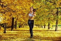 7965391-a-young-girl-jogging-among-golden-autumn-trees.jpg