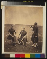 two-french-officers-seated-and-zouave-standing-with-arm-resting-on-rifle