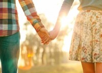 25434173-young-couple-in-love-walking-in-the-autumn-park-holding-hands-looking-in-the-sunset