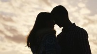 depositphotos_124123332-stock-video-silhouette-of-a-young-couple