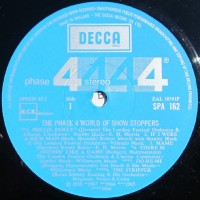 phase-4-world-of-show-stoppers---label-side-1